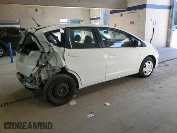 ✅ 2013 Honda Fit • VIN: JHMGE8H35DC042311 • Лот: 89647285. Опубликован ранее на Copart с пробегом 82 658 миль. Бесплатный доступ к архиву аукционных продаж из США и подробный отчёт об истории автомобиля на DreamBid. Изображение 3.