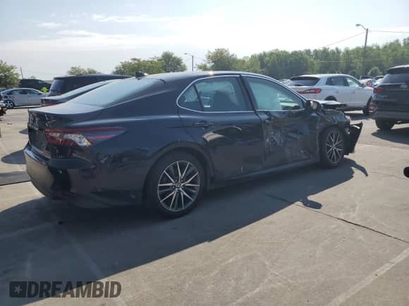 2023 Toyota Camry Hybrid XLE with VIN 4T1F31AK7PU602352, listed as a Copart auction lot 68065355 with 50,155 mi miles and Salvage title. Bid and sale history available at DreamBid. Image 3.