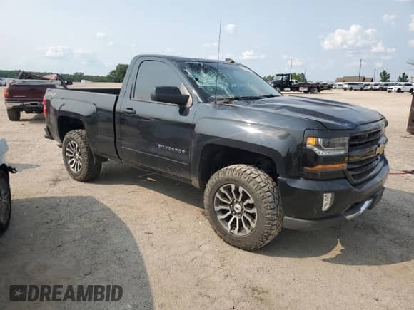 2017 Chevrolet Silverado 1500 LT с VIN 1GCNKREC5HZ218921, выставлен на аукционе Copart как лот 58866175 с пробегом 148 920 миль миль и Списание • Salvage title. История ставок и продаж доступна на DreamBid. Изображение 4.