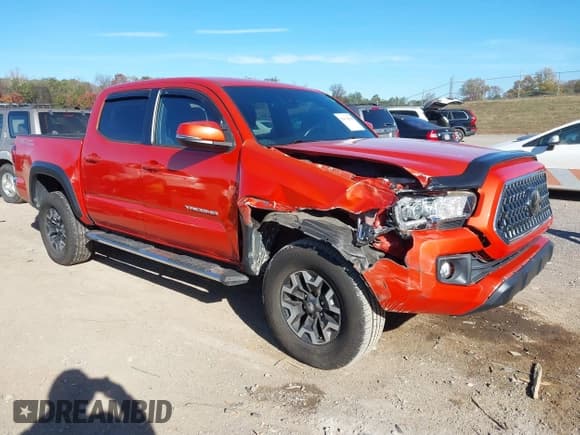 ✅ 2018 Toyota Tacoma TRD Sport • VIN: 3TMAZ5CN9JM060159 • Lot: 43674984. Listed on IAAI with 70,613 mi. Free auction sales archive from the USA and detailed vehicle history report at DreamBid. Image 1.