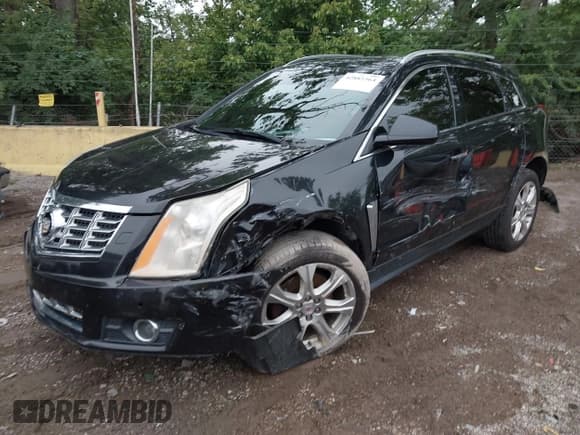 ✅ 2014 Cadillac SRX Performance Collection • VIN: 3GYFNFE35ES529956 • Lot: 42885364. Listed on IAAI with 223,000 mi. Free auction sales archive from the USA and detailed vehicle history report at DreamBid. Image 2.