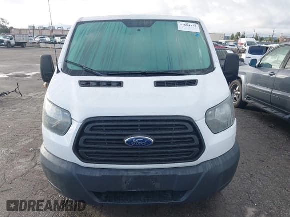 ✅ 2015 Ford Transit Cargo • VIN: 1FTNE1ZM8FKA86643 • Lot: 43684172. Listed on IAAI with 99,869 mi. Free auction sales archive from the USA and detailed vehicle history report at DreamBid. Image 11.