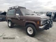 ✅ 1987 Ford Bronco • VIN: 1FMCU14T6HUB82055 • Lot: 84565204. Wystawiony na Copart z przebiegiem Nie podano. Bezpłatny archiwum sprzedaży aukcyjnych z USA i szczegółowy raport historii pojazdu na DreamBid. Zdjęcie 4.