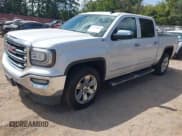 ✅ 2016 GMC Sierra 1500 SLT • VIN: 3GTU2NEC6GG210717 • Lot: 43277883. Listed on IAAI with 156,399 mi. Free auction sales archive from the USA and detailed vehicle history report at DreamBid. Image 2.