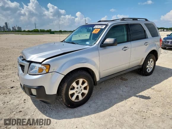 ✅ 2011 Mazda Tribute Grand Touring • VIN: 4F2CY9GG3BKM07203 • Lot: 62137295. Listed on Copart with 205,836 mi. Free auction sales archive from the USA and detailed vehicle history report at DreamBid. Image 1.