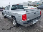 ✅ 2010 Dodge Dakota Bighorn/Lonestar • VIN: 1D7CW3GK4AS140049 • Lot: 42231805. Wystawiony na IAAI z przebiegiem 149 489 mil. Bezpłatny archiwum sprzedaży aukcyjnych z USA i szczegółowy raport historii pojazdu na DreamBid. Zdjęcie 3.