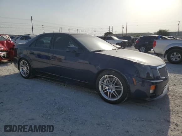 ✅ 2005 Cadillac CTS-V • VIN: 1G6DN56S050204168 • Lot: 60041084. Listed on Copart with 138,883 mi. Free auction sales archive from the USA and detailed vehicle history report at DreamBid. Image 4.
