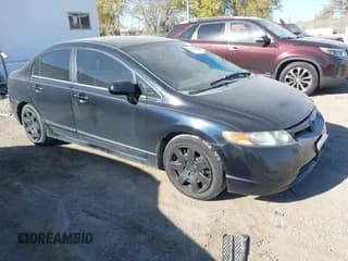 ✅ 2007 Honda Civic LX • VIN: 1HGFA165X7L099906 • Lot: 43623413. Listed on IAAI with 196,329 mi. Free auction sales archive from the USA and detailed vehicle history report at DreamBid. Image 1.