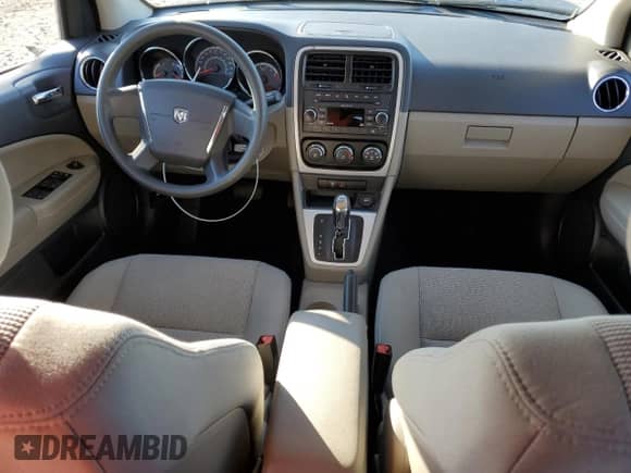 2011 Dodge Caliber Mainstreet с VIN 1B3CB3HA9BD295344, выставлен на аукционе Copart как лот 79101994 с пробегом Не указан миль и Списание • Salvage title. История ставок и продаж доступна на DreamBid. Изображение 8.