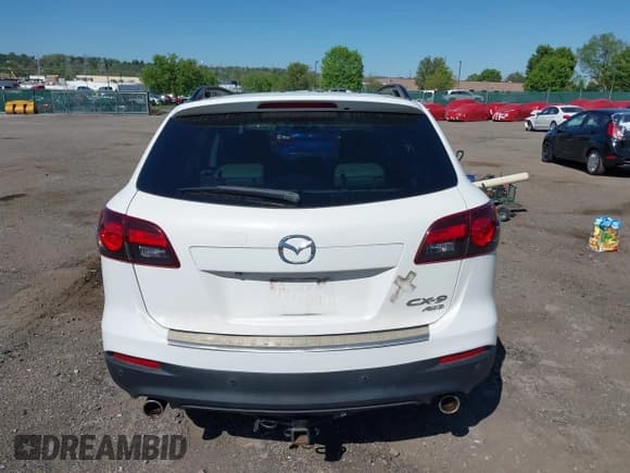✅ 2015 Mazda CX-9 Touring • VIN: JM3TB3CV1F0461403 • Lot: 42148325. Listed on IAAI with 143,452 mi. Free auction sales archive from the USA and detailed vehicle history report at DreamBid. Image 16.