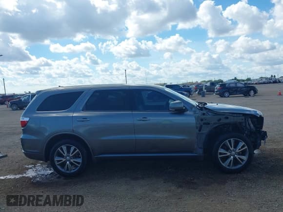 ✅ 2013 Dodge Durango R/T • VIN: 1C4SDHCT2DC535434 • Lot: 43343127. Listed on IAAI with 205,277 mi. Free auction sales archive from the USA and detailed vehicle history report at DreamBid. Image 14.