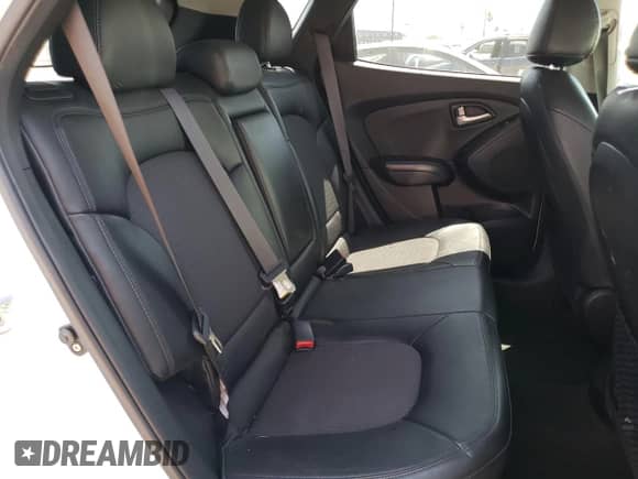 2012 Hyundai Tucson GLS z VIN KM8JU3AC2CU364867, wystawiony jako Copart lot #64456034 z przebiegiem 133 562 mil mil oraz Szkoda całkowita • Salvage title. Historia ofert i sprzedaży dostępna na DreamBid. Obrazek 12.