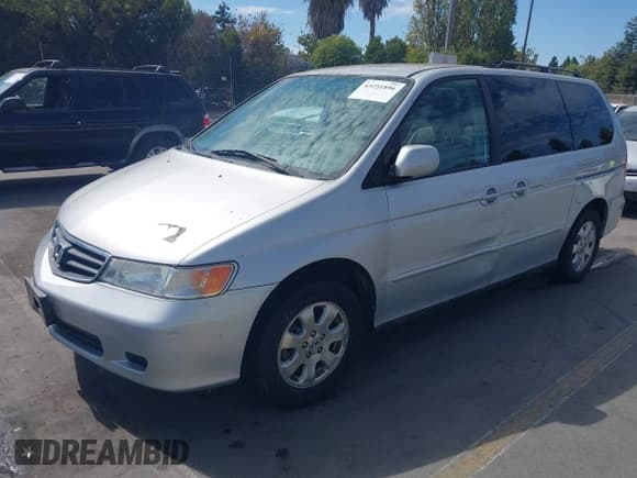 ✅ 2002 Honda Odyssey EX-L • VIN: 2HKRL189X2H561691 • Lot: 43251896. Wystawiony na IAAI z przebiegiem 208 458 mil. Bezpłatny archiwum sprzedaży aukcyjnych z USA i szczegółowy raport historii pojazdu na DreamBid. Zdjęcie 2.