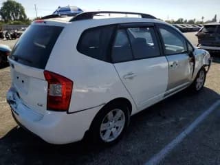 ✅ 2009 Kia Rondo LX • VIN: KNAFG529X97273401 • Лот: 75829094. Опубликован ранее на Copart с пробегом 171 062 миль. Бесплатный доступ к архиву аукционных продаж из США и подробный отчёт об истории автомобиля на DreamBid. Изображение 3.