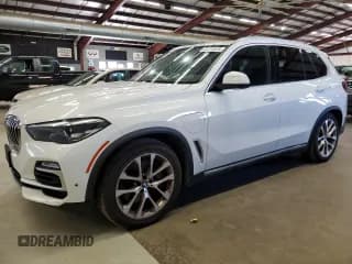 ✅ 2021 BMW X5 xDrive45e • VIN: 5UXTA6C01M9H25800 • Лот: 87217815. Опубликован ранее на Copart с пробегом 182 187 миль. Бесплатный доступ к архиву аукционных продаж из США и подробный отчёт об истории автомобиля на DreamBid. Изображение 1.