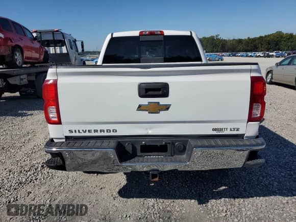 2017 Chevrolet Silverado 1500 LTZ with VIN 3GCUKSEC8HG410367, listed as a Copart auction lot 82293355 with 101,084 mi miles and Salvage title. Bid and sale history available at DreamBid. Image 6.
