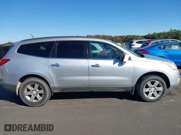 ✅ 2012 Chevrolet Traverse 2LT • VIN: 1GNKVJED2CJ323659 • Lot: 43464440. Listed on IAAI with 180,624 mi. Free auction sales archive from the USA and detailed vehicle history report at DreamBid. Image 13.