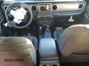 ✅ 2022 Jeep Wrangler Unlimited High Tide • VIN: 1C4HJXDG0NW247152 • Lot: 82371674. Listed on Copart with 32,417 mi. Free auction sales archive from the USA and detailed vehicle history report at DreamBid. Image 8.