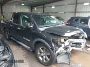 ✅ 2015 Nissan Titan SL • VIN: 1N6BA0ED7FN512364 • Lot: 43203608. Listed on IAAI with 106,996 mi. Free auction sales archive from the USA and detailed vehicle history report at DreamBid. Image 1.
