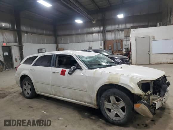 2007 Dodge Magnum с VIN 2D4FV47V57H716776, выставлен на аукционе Copart как лот 41766255 с пробегом Не указан миль и Списание • Salvage title. История ставок и продаж доступна на DreamBid. Изображение 4.