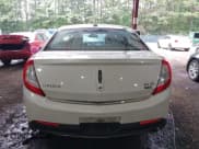 ✅ 2014 Lincoln MKS • VIN: 1LNHL9EK6EG610049 • Lot: 42438806. Listed on IAAI with 124,099 mi. Free auction sales archive from the USA and detailed vehicle history report at DreamBid. Image 16.