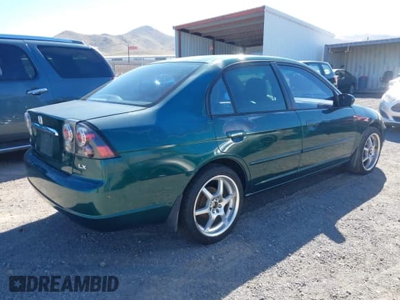 ✅ 2002 Honda Civic LX • VIN: 1HGES16552L072789 • Lot: 43492505. Listed on IAAI with 234,514 mi. Free auction sales archive from the USA and detailed vehicle history report at DreamBid. Image 4.