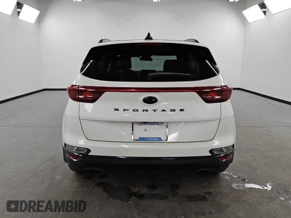 ✅ 2021 Kia Sportage S • VIN: KNDP63AC9M7856286 • Lot: 81574915. Listed on Copart with 82,306 mi. Free auction sales archive from the USA and detailed vehicle history report at DreamBid. Image 6.