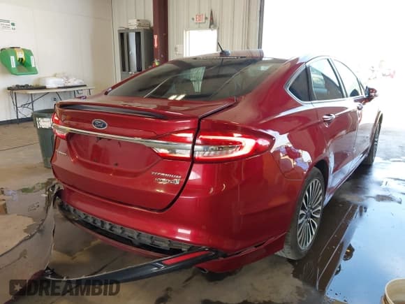 ✅ 2017 Ford Fusion Hybrid Titanium • VIN: 3FA6P0RUXHR158259 • Лот: 42463561. Опубликован ранее на IAAI с пробегом 206 211 миль. Бесплатный доступ к архиву аукционных продаж из США и подробный отчёт об истории автомобиля на DreamBid. Изображение 4.