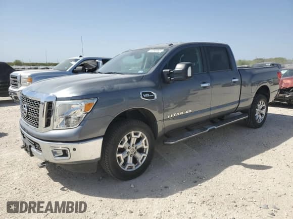 ✅ 2017 Nissan Titan SV • VIN: 1N6AA1F25HN556025 • Лот: 50098995. Опубликован ранее на Copart с пробегом 161 927 миль. Бесплатный доступ к архиву аукционных продаж из США и подробный отчёт об истории автомобиля на DreamBid. Изображение 1.