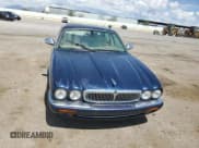 ✅ 2001 Jaguar XJ Vanden Plas • VIN: SAJDA24C21LF39612 • Lot: 67322335. Listed on Copart with 140,826 mi. Free auction sales archive from the USA and detailed vehicle history report at DreamBid. Image 5.