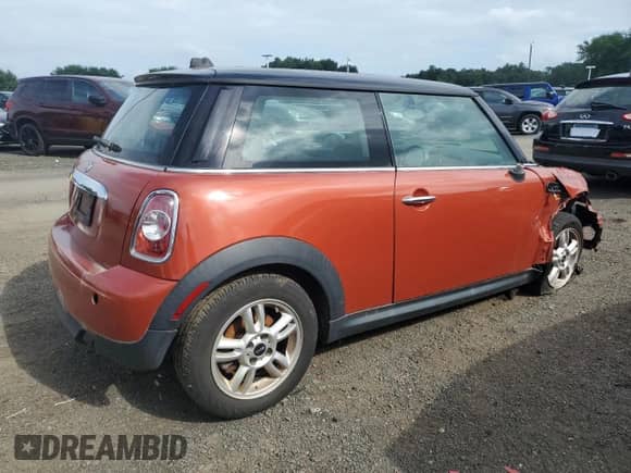 2012 MINI Hardtop with VIN WMWSU3C53CT260060, listed as a Copart auction lot 63656395 with 100,537 mi miles and Clean title. Bid and sale history available at DreamBid. Image 3.