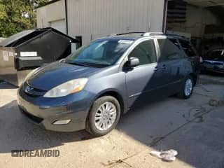 2010 Toyota Sienna XLE с VIN 5TDYK4CC6AS306693, выставлен на аукционе Copart как лот 80128555 с пробегом 198 791 миль миль и Списание • Salvage title. История ставок и продаж доступна на DreamBid. Изображение 1.