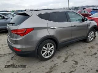 ✅ 2016 Hyundai Santa Fe • VIN: 5XYZW4LA7GG348089 • Лот: 37852943. Опубликован ранее на Copart с пробегом 122 001 миль. Бесплатный доступ к архиву аукционных продаж из США и подробный отчёт об истории автомобиля на DreamBid. Изображение 3.