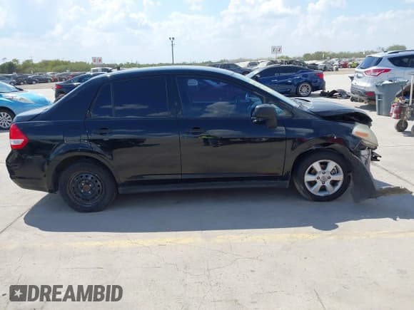 ✅ 2009 Nissan Versa 1.6 • VIN: 3N1CC11E19L481724 • Lot: 43417983. Listed on IAAI with 166,029 mi. Free auction sales archive from the USA and detailed vehicle history report at DreamBid. Image 13.