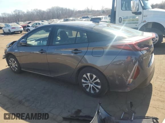 ✅ 2021 Toyota Prius LE • VIN: JTDKAMFP4M3175678 • Lot: 42037705. Listed on Copart with 56,938 mi. Free auction sales archive from the USA and detailed vehicle history report at DreamBid. Image 2.