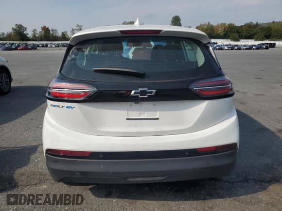 ✅ 2023 Chevrolet Bolt EV 1LT • VIN: 1G1FW6S07P4169808 • Lot: 82063945. Listed on Copart with 20,996 mi. Free auction sales archive from the USA and detailed vehicle history report at DreamBid. Image 6.