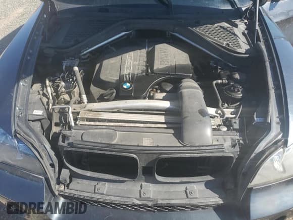 ✅ 2012 BMW X5 35i • VIN: 5UXZV4C57CL987933 • Lot: 63698065. Listed on Copart with Not provided. Free auction sales archive from the USA and detailed vehicle history report at DreamBid. Image 12.