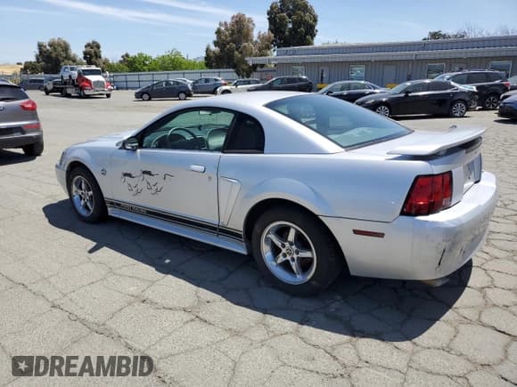 ✅ 2004 Ford Mustang Standard • VIN: 1FAFP40684F199938 • Lot: 56705465. Listed on Copart with 182,008 mi. Free auction sales archive from the USA and detailed vehicle history report at DreamBid. Image 2.