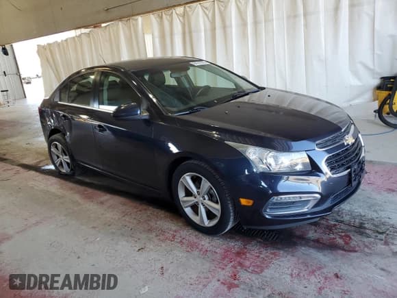 ✅ 2015 Chevrolet Cruze LT • VIN: 1G1PE5SB3F7242317 • Lot: 84747505. Listed on Copart with 118,864 mi. Free auction sales archive from the USA and detailed vehicle history report at DreamBid. Image 4.