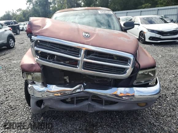 2002 Dodge Dakota SLT z VIN 1B7HL48X62S662174, wystawiony jako Copart lot #84585345 z przebiegiem 213 924 mil mil oraz Szkoda całkowita • Salvage title. Historia ofert i sprzedaży dostępna na DreamBid. Obrazek 5.