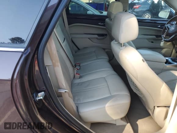 ✅ 2015 Cadillac SRX Performance Collection • VIN: 3GYFNCE37FS529876 • Lot: 93315615. Wystawiony na Copart z przebiegiem 135 088 mil. Bezpłatny archiwum sprzedaży aukcyjnych z USA i szczegółowy raport historii pojazdu na DreamBid. Zdjęcie 11.