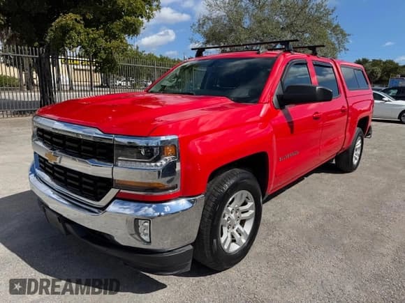 ✅ 2018 Chevrolet Silverado 1500 LT • VIN: 3GCPCREC9JG374486 • Лот: 44950235. Опубликован ранее на Copart с пробегом 85 495 миль. Бесплатный доступ к архиву аукционных продаж из США и подробный отчёт об истории автомобиля на DreamBid. Изображение 1.