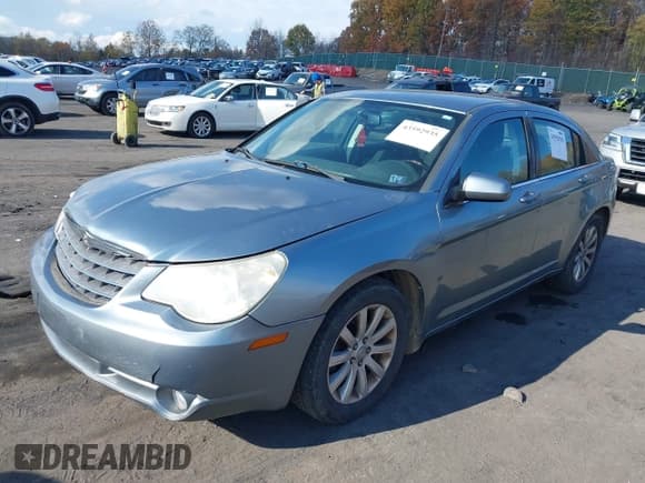 ✅ 2010 Chrysler Sebring Limited • VIN: 1C3CC5FB9AN161160 • Lot: 43592935. Listed on IAAI with 142,313 mi. Free auction sales archive from the USA and detailed vehicle history report at DreamBid. Image 2.