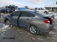 ✅ 2018 Chevrolet Cruze LT • VIN: 1G1BE5SM1J7130586 • Lot: 38795463. Listed on Copart with 99,657 mi. Free auction sales archive from the USA and detailed vehicle history report at DreamBid. Image 2.