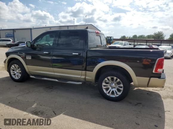 ✅ 2015 Ram 1500 Laramie Longhorn • VIN: 1C6RR6PM1FS722591 • Лот: 65759143. Опубликован ранее на Copart с пробегом 127 671 миль. Бесплатный доступ к архиву аукционных продаж из США и подробный отчёт об истории автомобиля на DreamBid. Изображение 2.