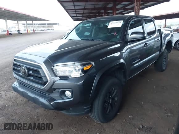 ✅ 2023 Toyota Tacoma SR5 • VIN: 3TMAZ5CN6PM199982 • Lot: 43087053. Listed on IAAI with 38,883 mi. Free auction sales archive from the USA and detailed vehicle history report at DreamBid. Image 2.