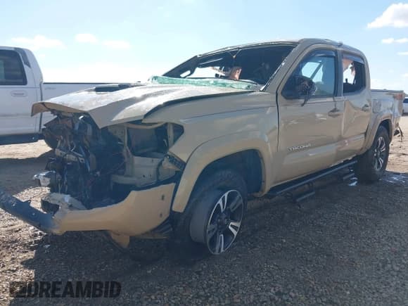 ✅ 2017 Toyota Tacoma SR5 • VIN: 5TFCZ5AN2HX121674 • Lot: 43700985. Listed on IAAI with 108,269 mi. Free auction sales archive from the USA and detailed vehicle history report at DreamBid. Image 2.
