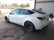 ✅ 2023 Tesla Model Y Long Range • VIN: 7SAYGAEE0PF787216 • Lot: 41589954. Listed on IAAI with 17,985 mi. Free auction sales archive from the USA and detailed vehicle history report at DreamBid. Image 3.