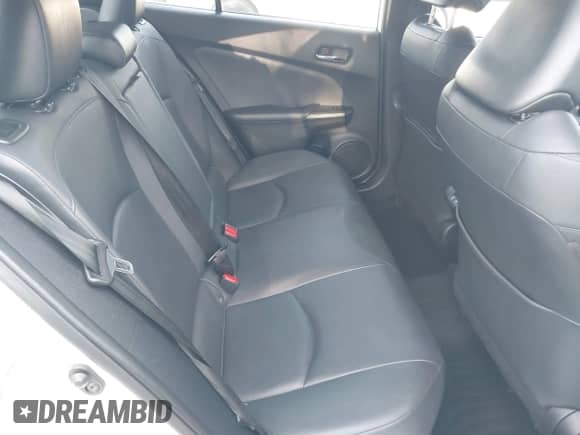 2021 Toyota Prius L Eco with VIN JTDKAMFU9M3131228, listed as a IAAI auction lot 41257117 with 72,840 mi miles and . Bid and sale history available at DreamBid. Image 8.