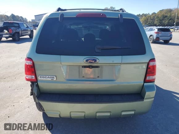 ✅ 2008 Ford Escape XLT • VIN: 1FMCU03Z18KB76501 • Lot: 91037435. Listed on Copart with 162,593 mi. Free auction sales archive from the USA and detailed vehicle history report at DreamBid. Image 6.
